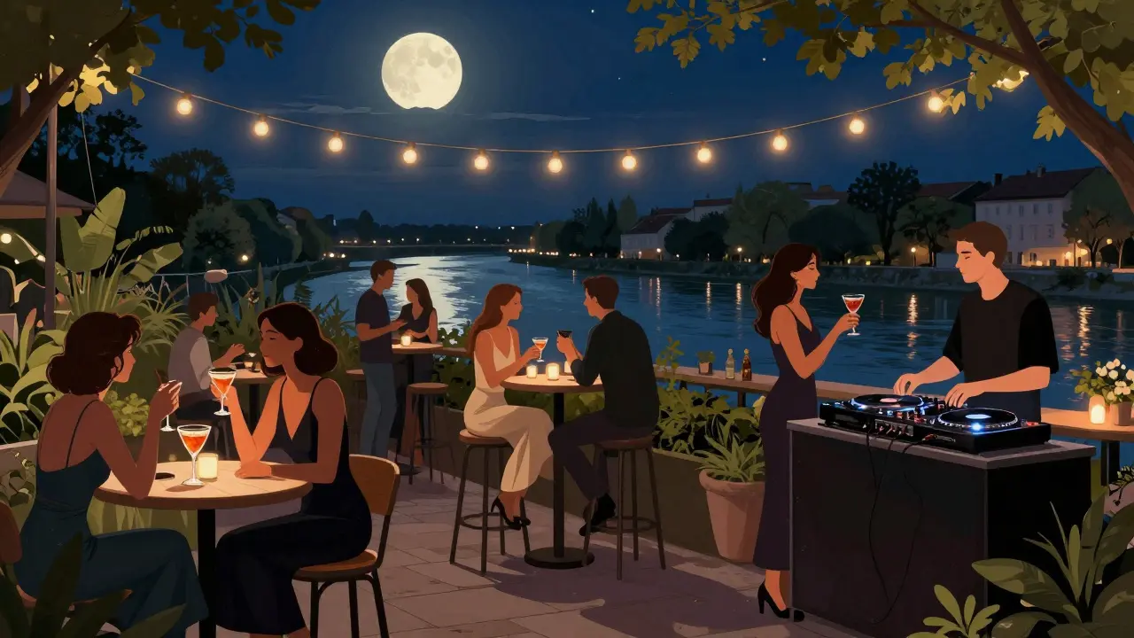 An elegant outdoor terrace at Pacha Munich with guests enjoying cocktails under string lights and moonlight.